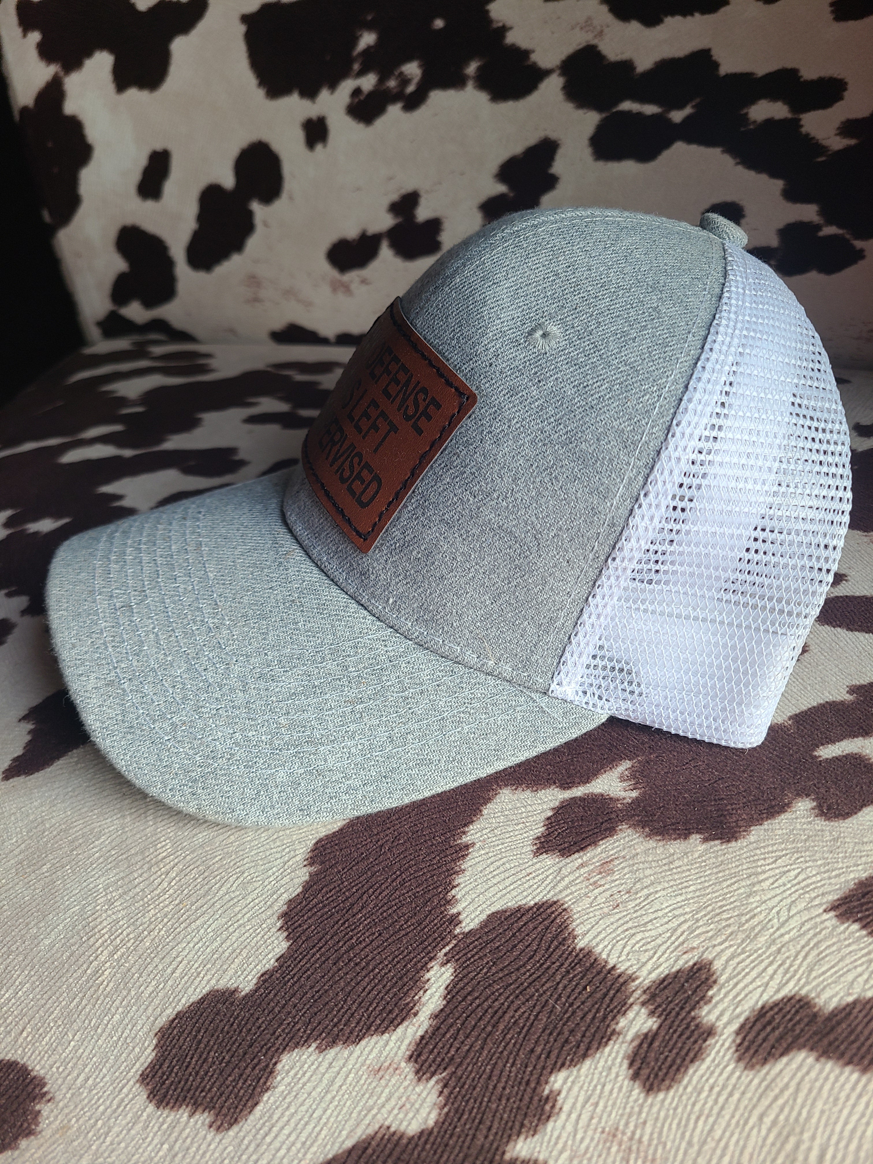 "In My Defense" Trucker Hat